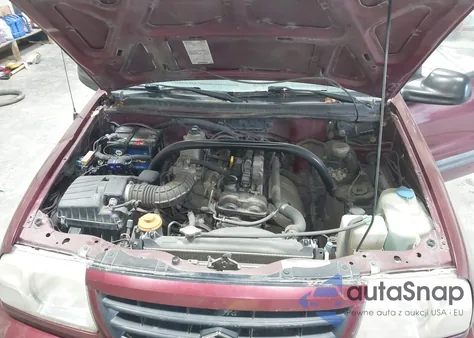 2003 Suzuki Vitara from USA, damaged, VIN 2S3TD52V036103732